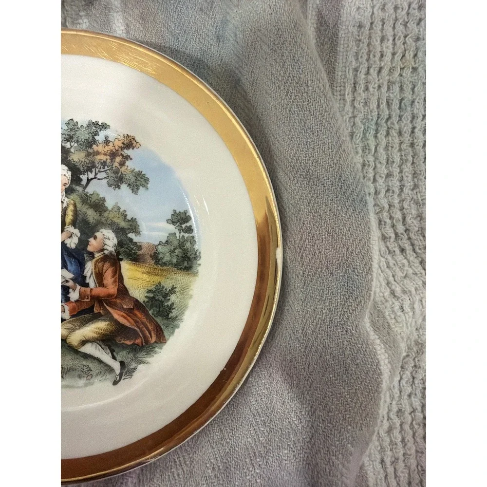 Vintage A Capsco Product 22K Gold Courting Couple Tea Cup and Saucer Set